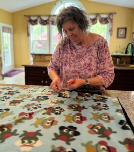 Karen making a blanket